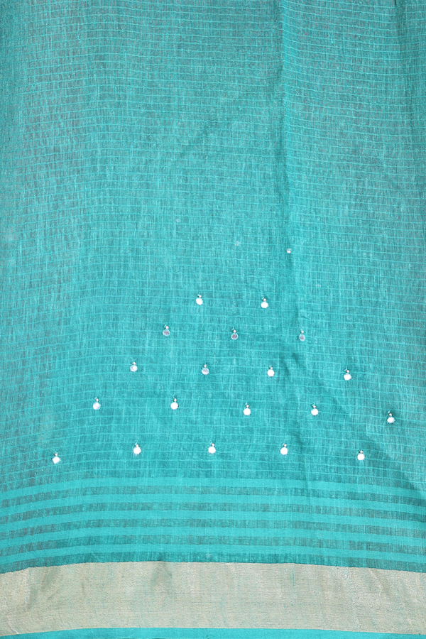 Linen Saree In Green With Mirror Work Buttis