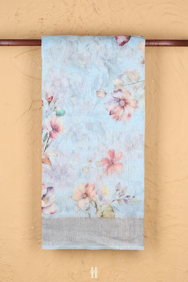 Linen Saree In Pastel Blue With Floral Printed Design
