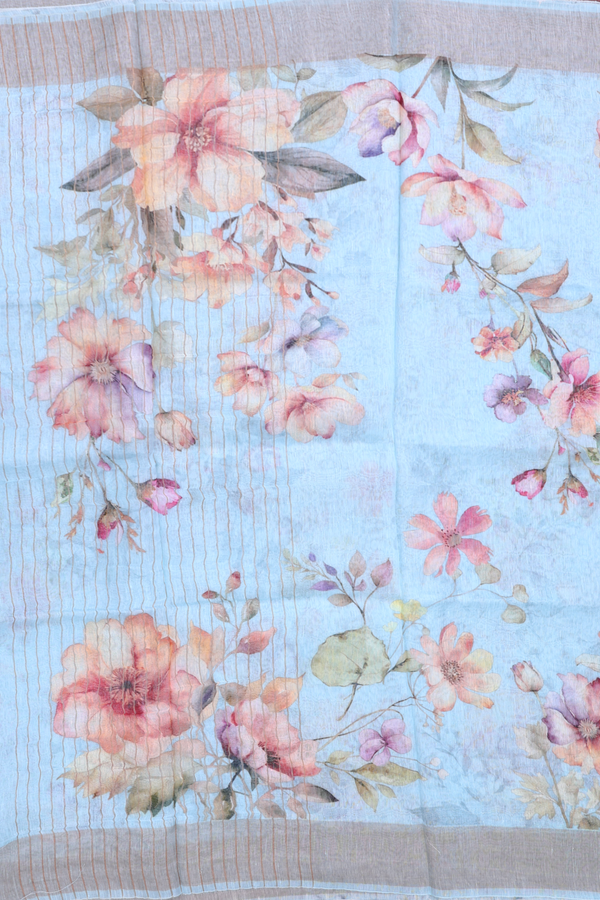 Linen Saree In Pastel Blue With Floral Printed Design