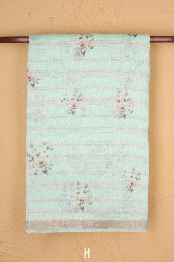 Linen Saree In Pastel Green With Floral Design