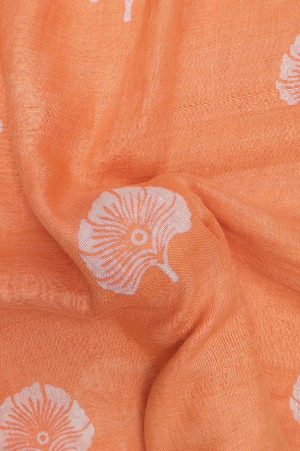Linen Saree In Pastel Orange With Floral Buttas
