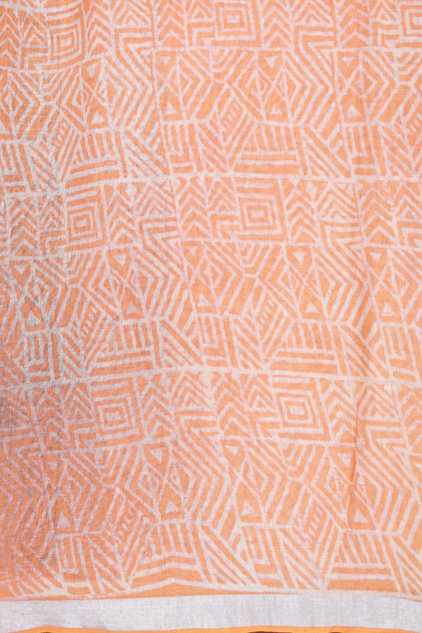 Linen Saree In Pastel Orange With Floral Buttas