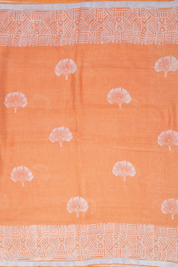Linen Saree In Pastel Orange With Floral Buttas