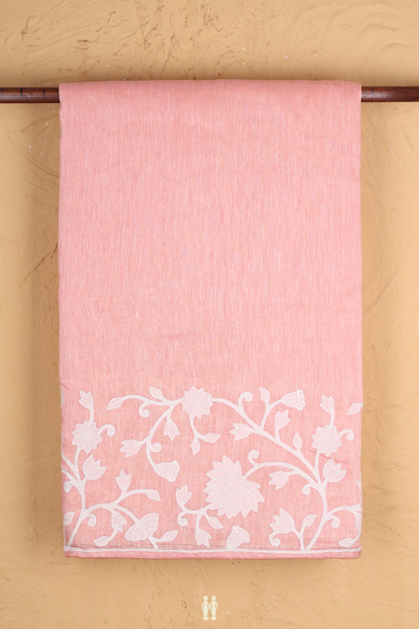 Linen Saree In Plain Blush Orange With Floral Border