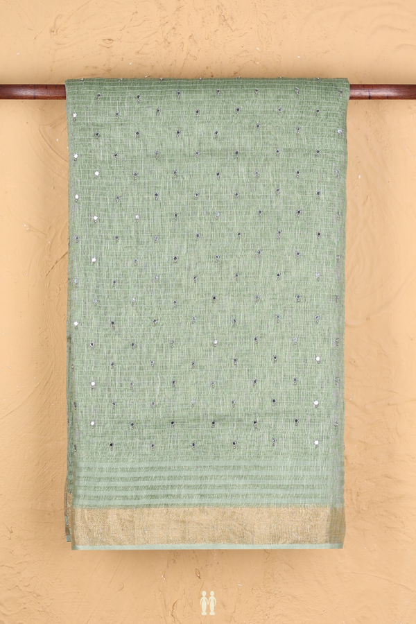 Linen Saree In Sage Green With Mirror Work Buttis