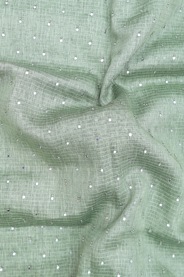 Linen Saree In Sage Green With Mirror Work Buttis
