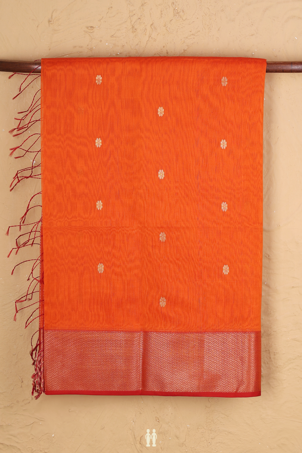 Maheswari Silk Cotton Saree In Orange With Floral Buttas