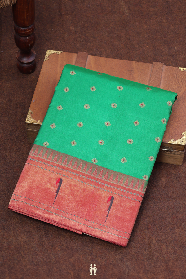 Paithani Silk Saree In Green With Floral Buttas