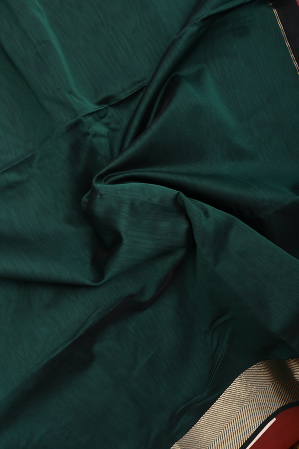 Maheswari Silk Cotton Saree In Bottle Green With Zari Border
