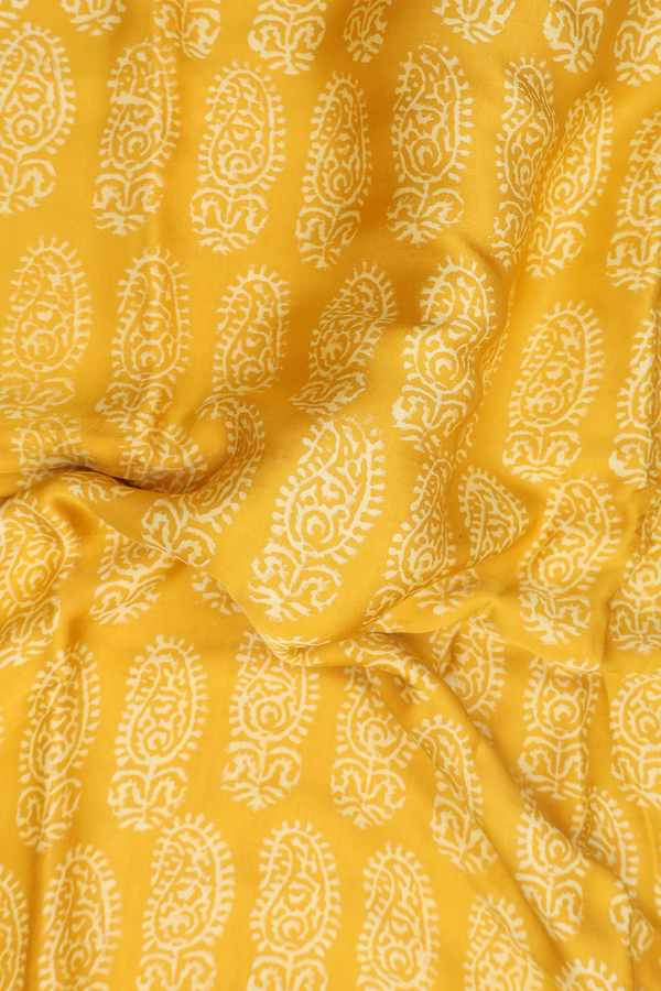 Modal Silk Saree In Saffron Yellow With Paisley Design