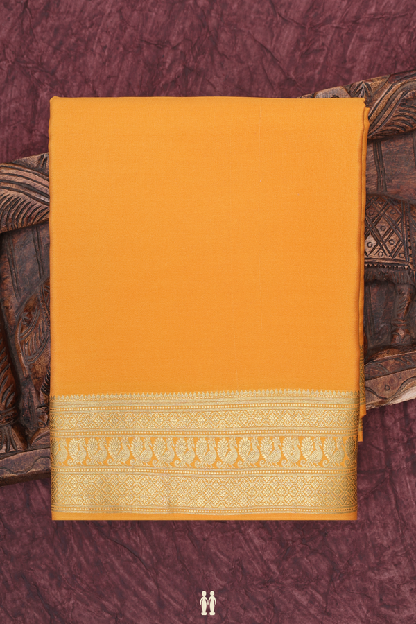Mysore Silk Saree In Plain Orange With Peacock Border