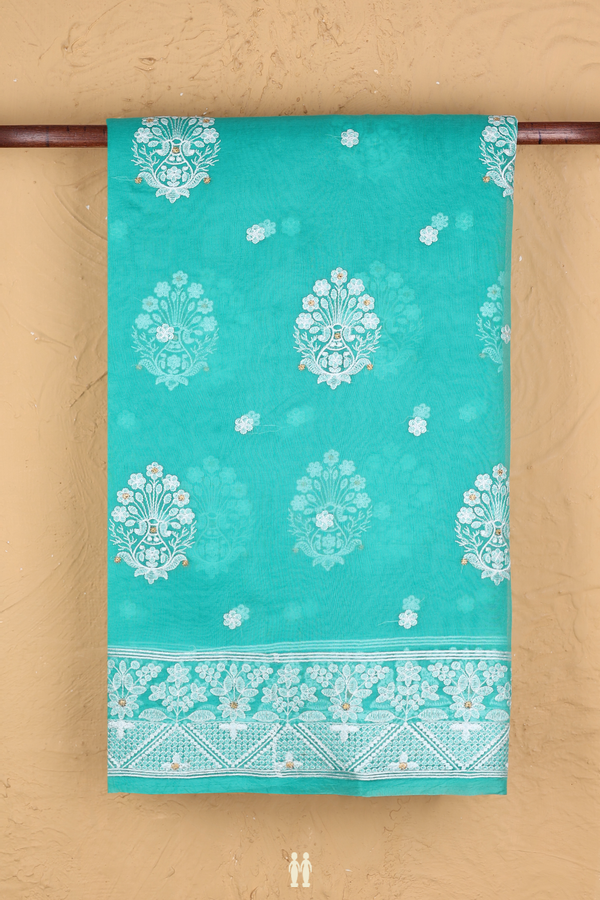 Organza Silk Saree In Light Sea Green With Embroidered Buttas
