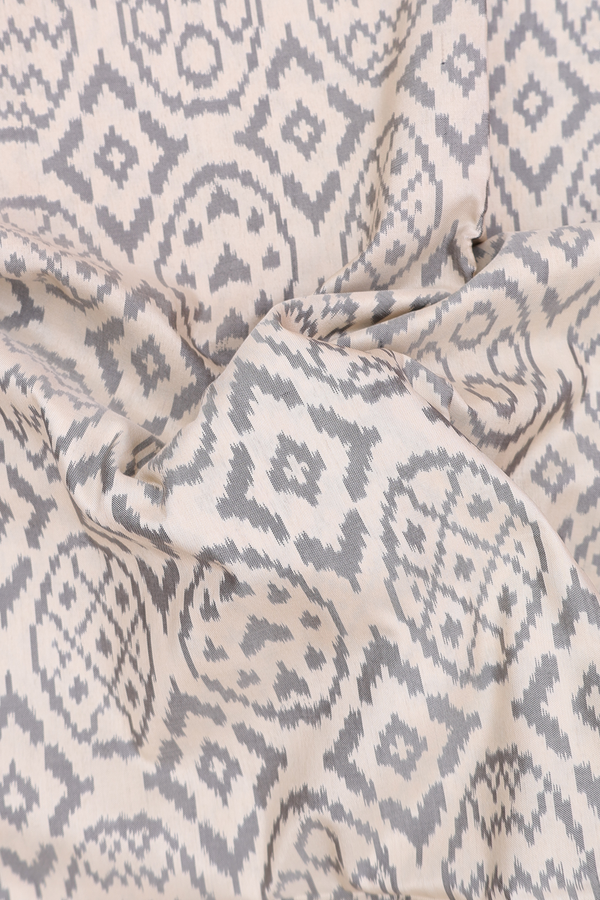Pochampally Silk Saree In Cream Color With Allover Design