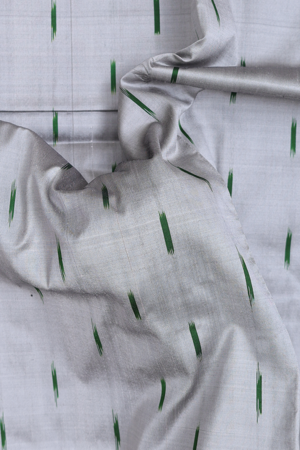 Pochampally Silk Saree In Grey With Ikat Buttas