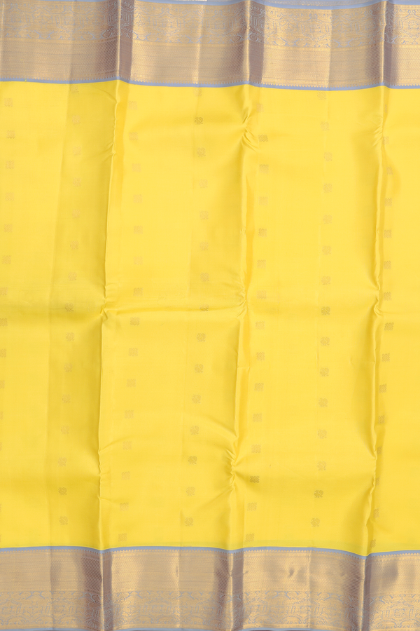 Kanchipuram Silk Saree In Yellow With Peacock Buttas