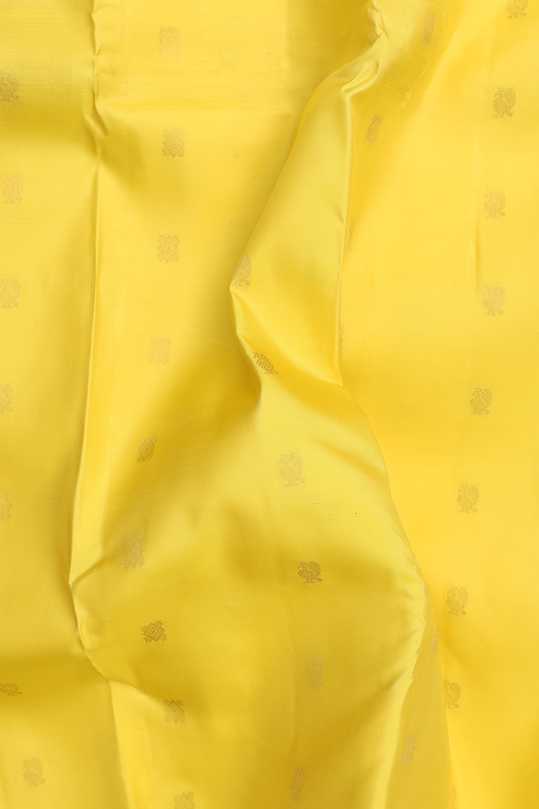 Kanchipuram Silk Saree In Yellow With Peacock Buttas