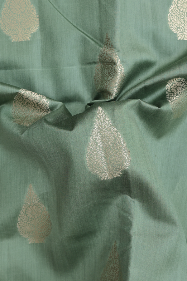 Raw Silk Saree In Sage Green With Zari Motifs