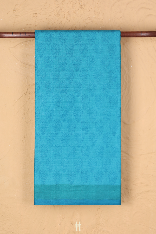 Tussar Silk Saree In Deep Sky Blue With Floral Buttas
