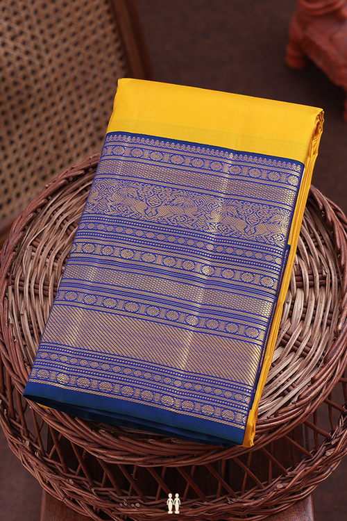 Kanchipuram Silk Saree In Yellow With Paisley Buttas