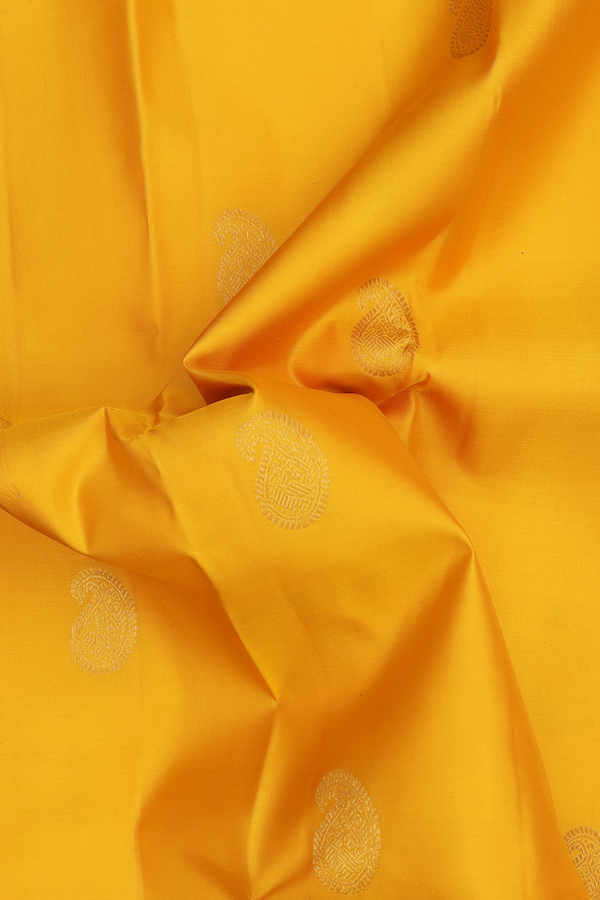 Kanchipuram Silk Saree In Yellow With Paisley Buttas