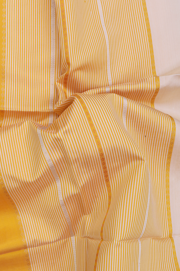 Soft Silk Saree In Cream And Yellow With Stripes Design
