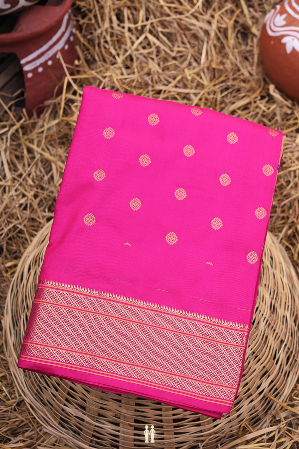Paithani Silk Saree In Magenta With Chakram Buttas