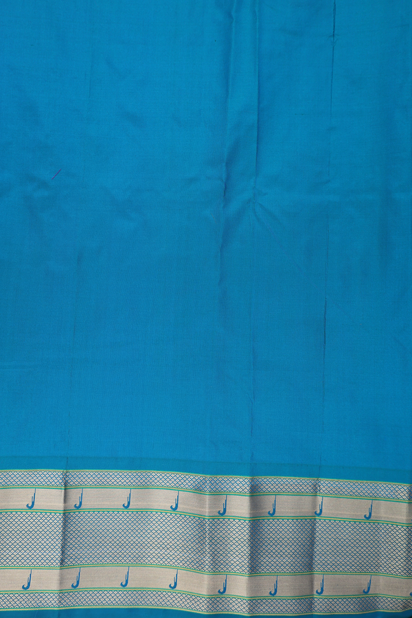 Paithani Silk Saree In Peacock Blue With Floral Buttas
