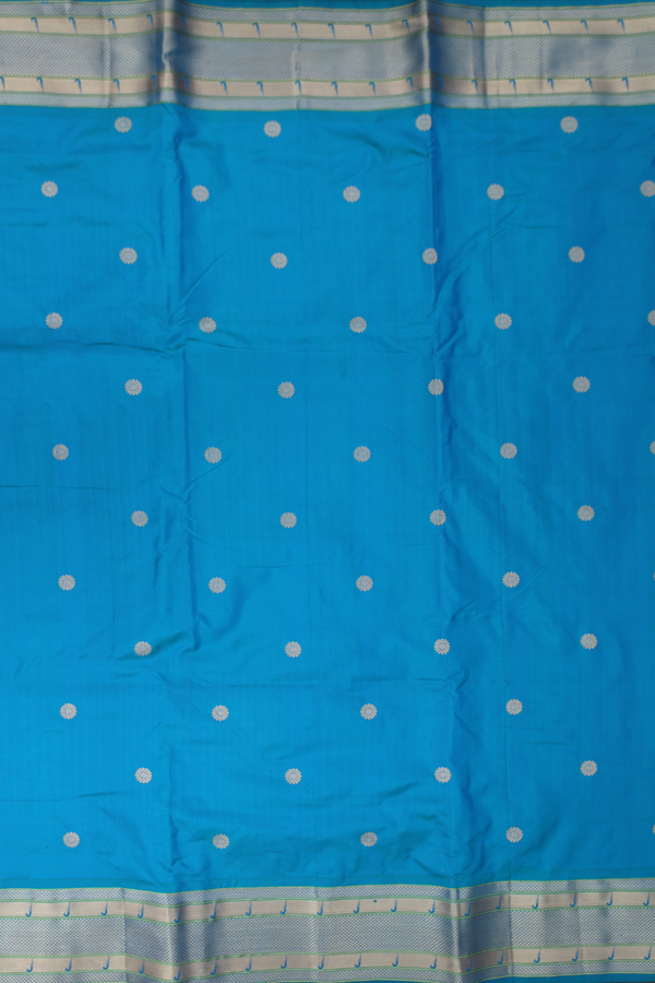 Paithani Silk Saree In Peacock Blue With Floral Buttas