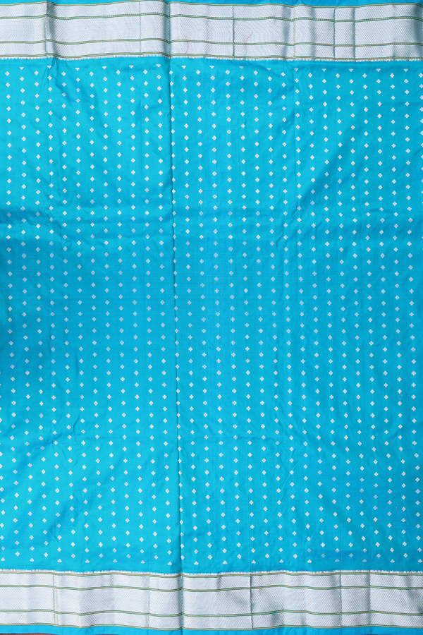 Paithani Silk Saree In Peacock Blue With Floral Buttis