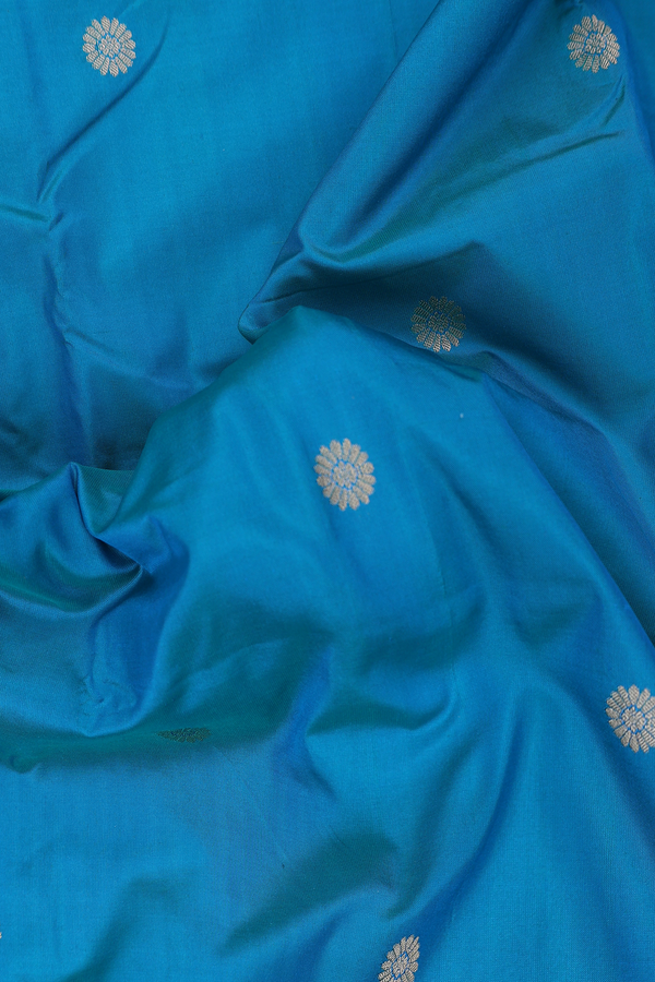 Paithani Silk Saree In Peacock Blue With Floral Buttas