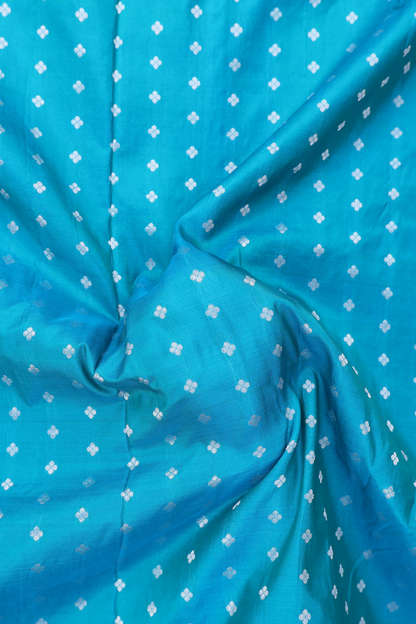 Paithani Silk Saree In Peacock Blue With Floral Buttis