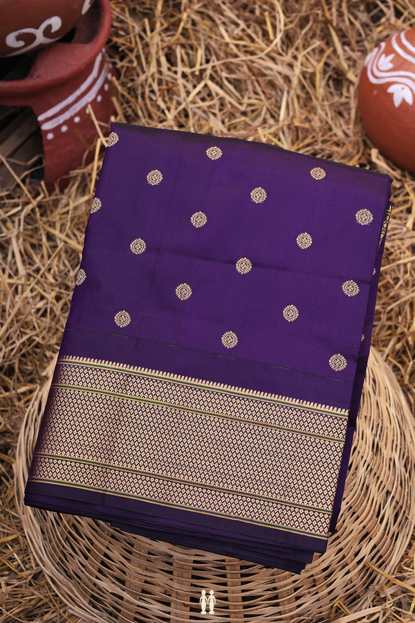 Paithani Silk Saree In Regal Purple With Chakram Buttas