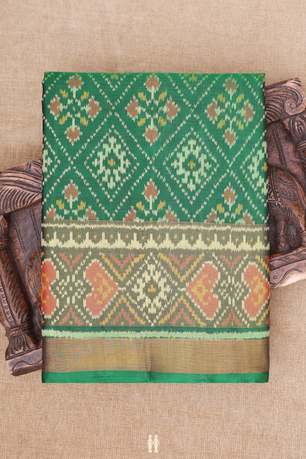 Patola Silk Saree In Emerald Green With Diamond Design