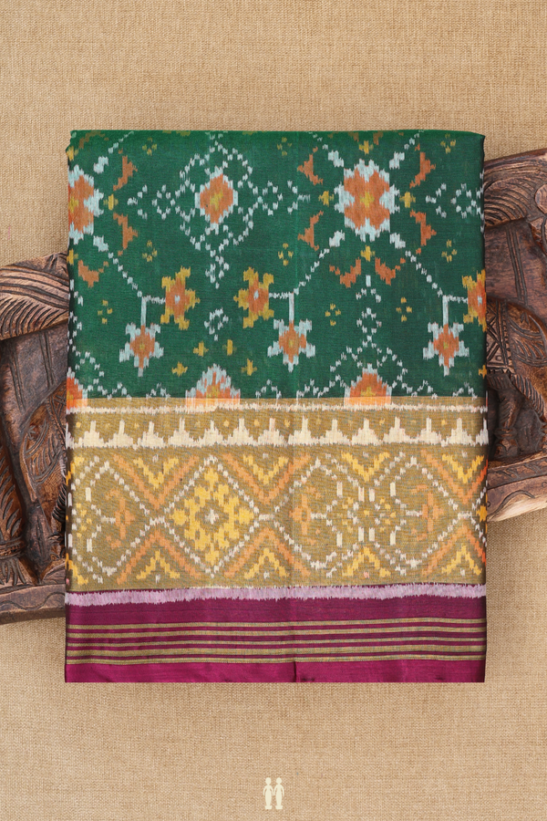 Patola Silk Saree In Forest Green With Ikat Design