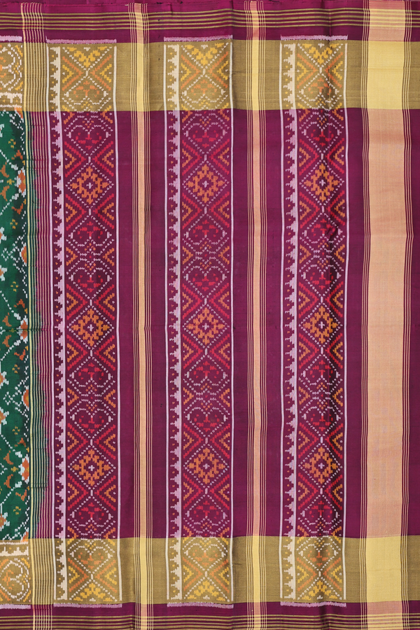 Patola Silk Saree In Forest Green With Ikat Design
