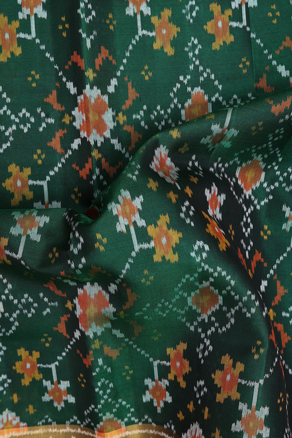 Patola Silk Saree In Forest Green With Ikat Design