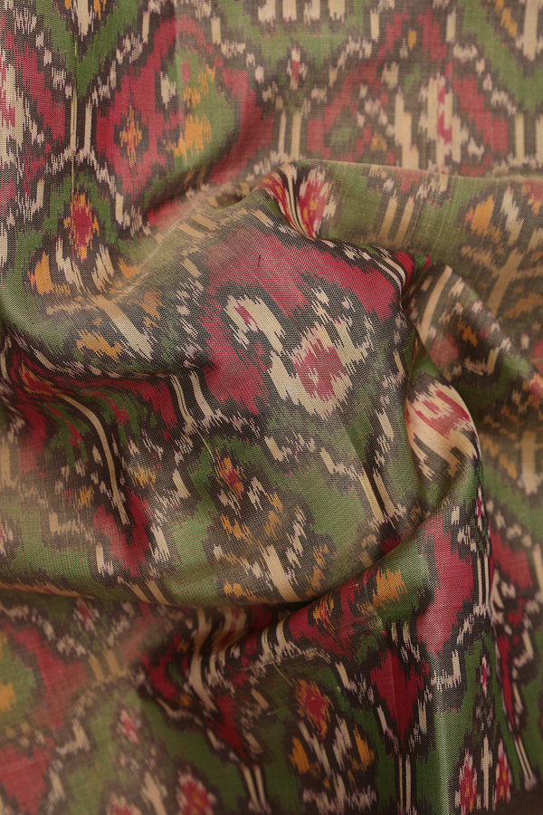 Patola Silk Saree In Green Red With Elephant And Parrot Design