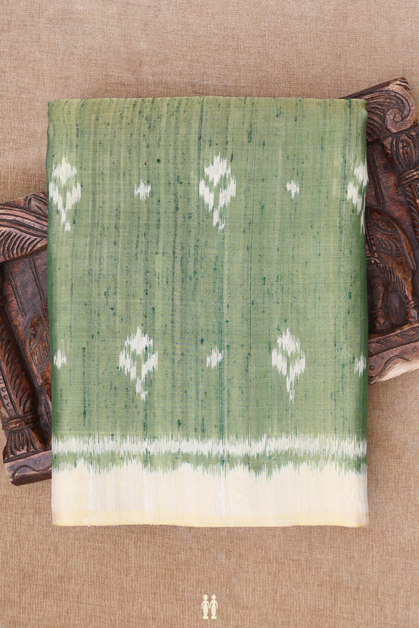 Patola Silk Saree In Green With Printed Buttas