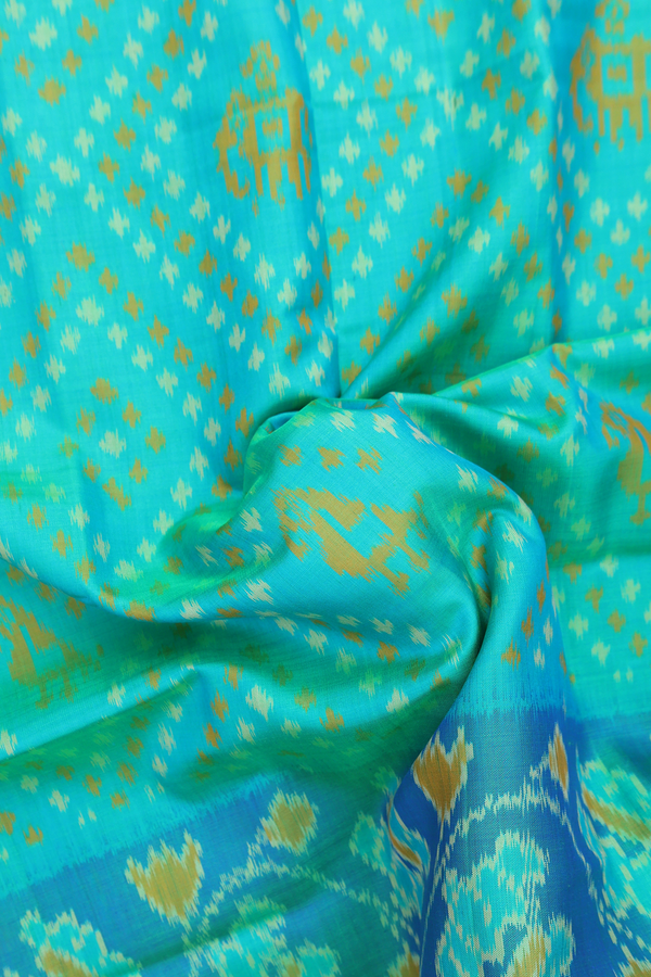 Patola Silk Saree In Green With Printed Design