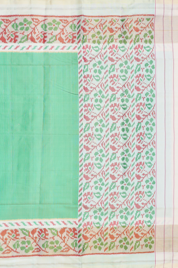 Patola Silk Saree In Plain Green With Contrast Border