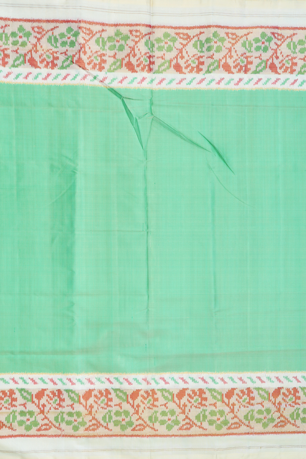 Patola Silk Saree In Plain Green With Contrast Border