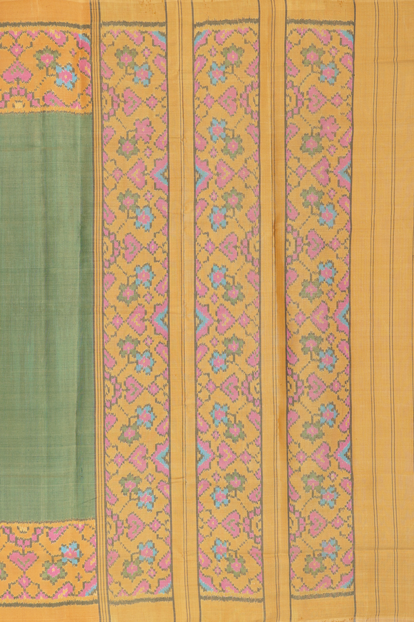 Patola Silk Saree In Plain Green With Printed Border