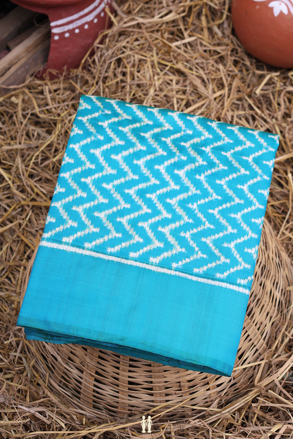 Pochampally Silk Saree In Peacock Blue With Chevron Design