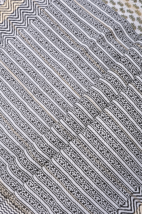 Printed Cotton Saree In Egg White With Allover Floral Buttas
