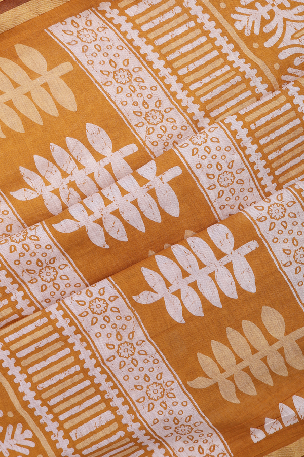 Printed Cotton Saree In Golden Yellow With Allover Design