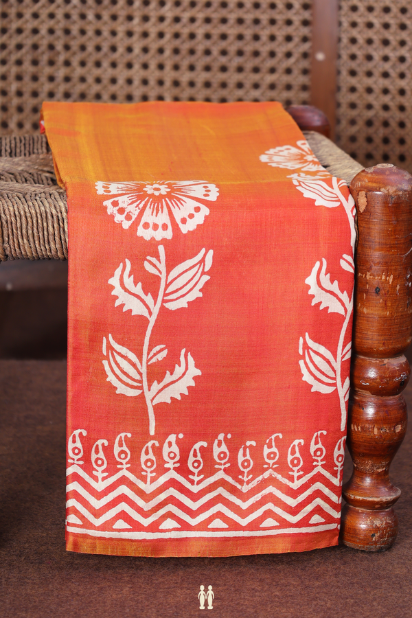 Printed Silk Saree In Coral Orange With Floral Design