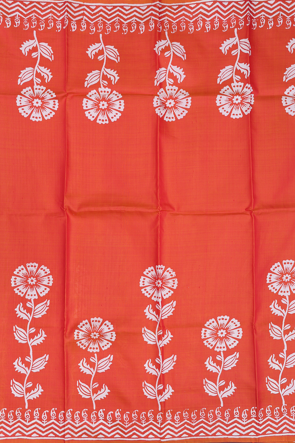 Printed Silk Saree In Coral Orange With Floral Design