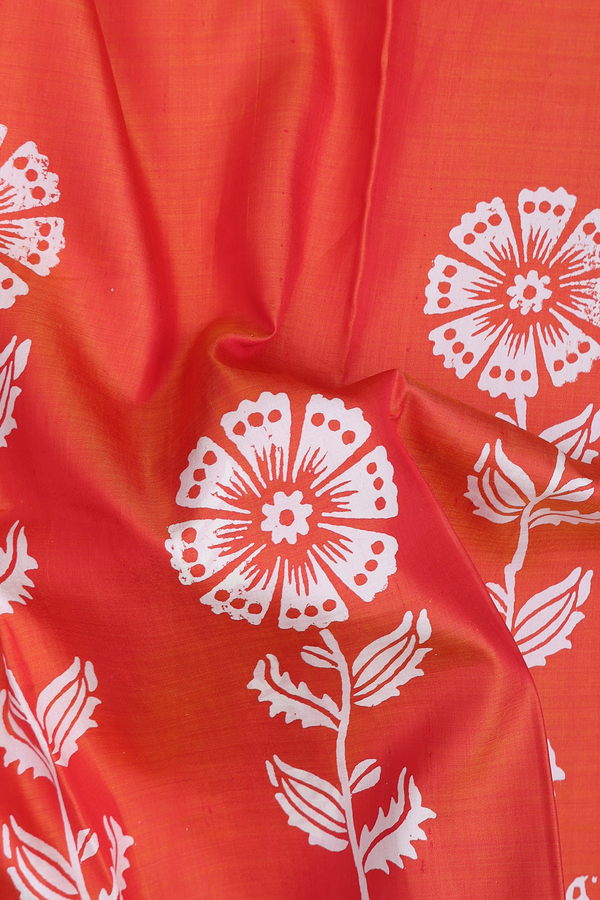 Printed Silk Saree In Coral Orange With Floral Design