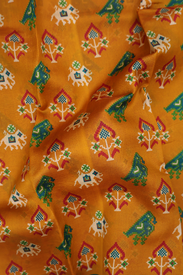 Printed Silk Saree In Golden Brown With Ikat Design