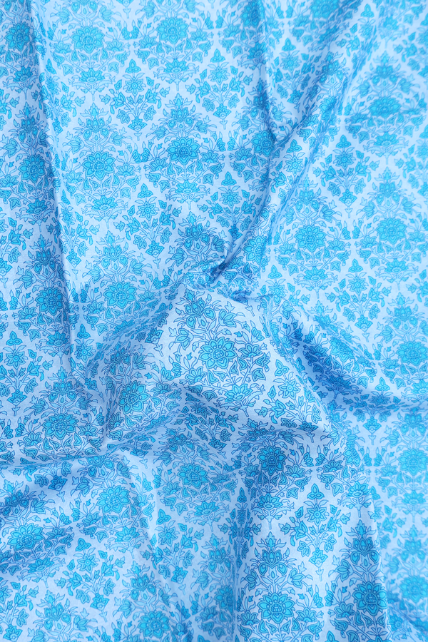 Printed Silk Saree In Pastel Blue With Floral Design